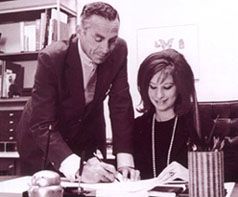 Barbra Streisand signing recording contract with Columbia's Goddard Lieberson, Oct 1962.