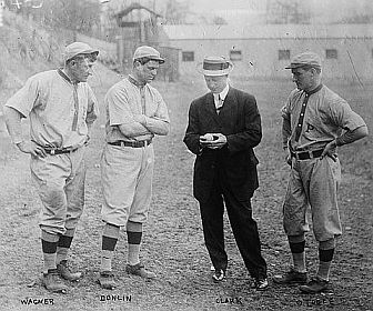 Wagner at left in 1912 photo with Pittsburgh teammates Mike Donlin, manager Fred Clarke and Marty O’Toole.