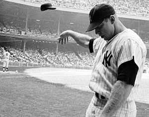 1965 Life magazine photo of Mantle throwing batting helmet in frustration – but check out those forearms!