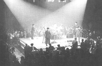 At the Washington Coliseum, the Beatles performed on a boxing-ring stage, changing position during the show. Feb 11, 1964.