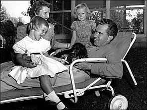 Nixon with wife Pat, two daughters & their dog, Checkers.