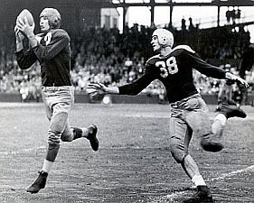 Sammy Baugh played in the day of 'two way' players, excelling as a defensive back as well as a quarterback, here making an interception.