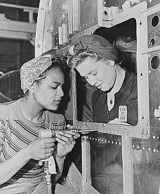 WWII-era photo showing Dora Miles and Dorothy Johnson at Douglas Aircraft Co. plant in Long Beach, CA.