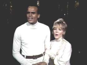 Harry Belafonte and Petula Clark in their ‘controversial’ touching scene that one Chrysler official wanted removed from the performance.