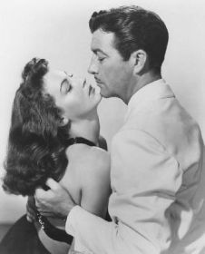 Ava Gardner and Robert Taylor in the 1949 film, ‘The Bribe.’ Click for DVD.