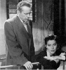 Ava Gardner w/ Humphrey Bogart in 1954's ‘The Barefoot Contessa.’ Click for film.