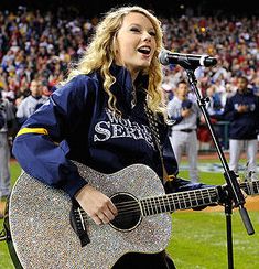 Taylor Swift performs National Anthem at game 3 of the World Series, Oct 25, 2008 in Philadelphia. Photo, John Mabangalo-Pool, Getty Images.