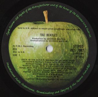 ‘Dear Prudence’ appears as the 2nd song on side one of the Beatles two-disc ‘White Album,’ shown here on the Apple record label in its 33.3 rpm vinyl version.
