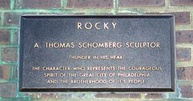 Earlier base plate on the Rocky statue with inscription: "Thunder In His Heart. The Character Who Represents The Courageous Spirit of the Great City of Philadelphia And The Brotherhood of It's [sic] People."