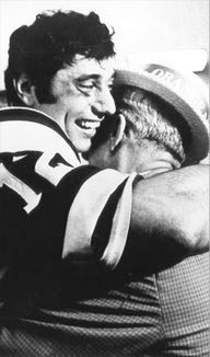 Joe Namath embraces his Dad, John Namath, at end of Super Bowl III, who he credits with giving him confidence in sport as a young boy.