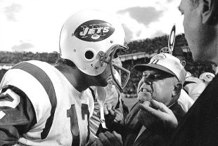 NYJets coach Weeb Ewbank congratulates Joe Namath in the closing seconds of the Jets’ 16-7 Super Bowl III victory in Miami, Jan. 12, 1969. AP photo.
