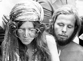 Janis Joplin & David Niehaus on Copacabana Beach in Brazil, 1970, where Janis was surrounded by, and talking with, reporters.