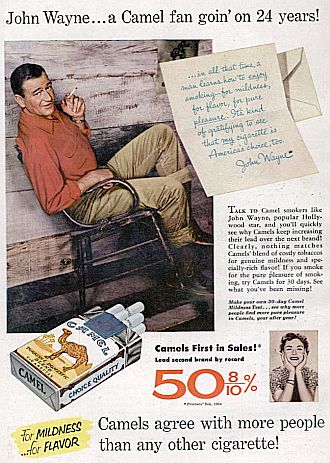 An R. J. Reynolds magazine ad for Camel cigarettes features Hollywood star John Wayne, appearing to offer a personal note in his endorsement of Camels. Life magazine, July 1954.