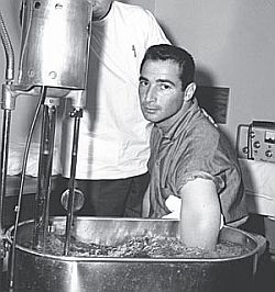 Sandy Koufax, the L.A. Dodgers’ star pitcher,  soaking his arm in a whirlpool after a game in April 1964. - AP photo.