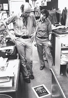 Milt Glaser & Walter Bernard at New York magazine offices pondering a cover design,  1974. (Photo: Cosmos Sarchiapone).