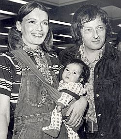 1973: A younger Mia Farrow with adopted baby Lark and then husband Andre Previn.