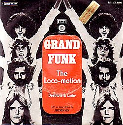 Cover sleeve issued in Spain by EMI for “The Loco-Motion” single, 1974. Click for digital remaster.