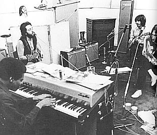 The Beatles at work in London studio in 1969 with keyboard player Billy Preston, lower left. Click for related sessions book.