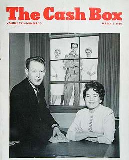 Bob Reisdorff and Bonnie Guitar of Dolphin Records with The Fleetwoods in the background, “Cash Box” magazine, March 5, 1960.