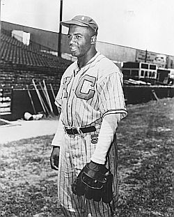 Jackie Robinson with the Kansas City Monarchs of the Negro Baseball League, 1945. Click for photo.