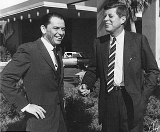 Frank Sinatra with then-U.S. Senator John F. Kennedy outside of The Sands hotel in Las Vegas, NV, Feb 1960, when Kennedy stayed there during a campaign swing.
