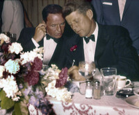 Frank Sinatra & JFK huddle during a dinner at the Democratic National Convention in Los Angeles, July 1960.