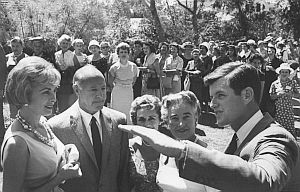 Actress Janet Leigh, left, listens to JFK campaign coordinator Edward M. Kennedy, far right, at rally for his brother at Janet Leigh’s home, Sept 1960.