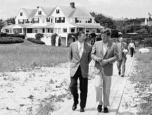 1961: President Kennedy walking with Defense Secretary Robert McNamara at Hyannis Port, MA.