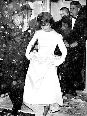 Jan. 19, 1961: Jackie Kennedy stepping out into the snowfall en route to Inaugural Gala with JFK behind her.