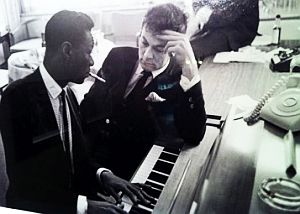 Nat King Cole and Tony Curtis preparing for show at JFK inauguration.  Photo, Phil Stern.