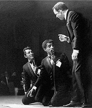 Dean Martin, Sammy Davis, Jr., and Frank Sinatra on stage during one of their performances, 1960s.