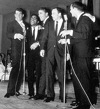 The Rat Pack on stage together in a 1960s' performance.