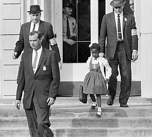Ruby Bridges exiting the William Frantz school in New Orleans,  November 1960, with U.S. marshals.