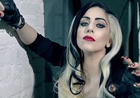 Lady Gaga in her own “paws up” pose.