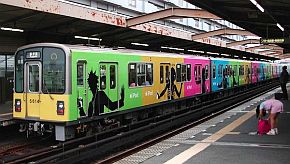 Apple iPod silhouette advertising on Japan Railway cars. 