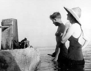 National wildlife artist Bob Hines and Rachel Carson search out marine specimens in the Florida Keys around 1955. The two spent time in the field for the USFWS visiting Atlantic coast refuges gathering material for agency publications. Hines’ drawings also appear in “The Edge of the Sea.”