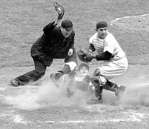 Oct 6, 1950: Yogi Berra making tag at the plate on Philadelphia Phillies’ Granny Hamner in 9th inning, Game 1, 1950 World Series. AP photo.