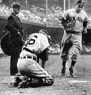 1951: Yogi Berra rounding the bases to home plate after what appears to have been a home run.