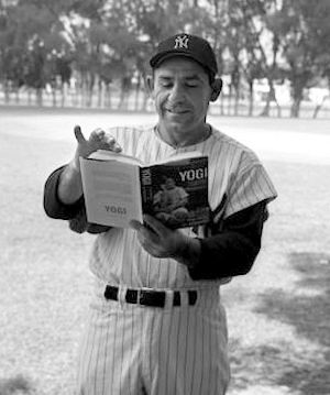 Yogi Berra reading from his 1961 autobiography at Yankee spring training camp. Tony Kubek photo for Life.