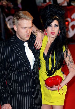 Another photo of Alex Clare, without beard, in February 2007 escorting Amy Winehouse at the Brit Awards in London, the British equivalent of the Grammy Awards. Winehouse won Best British Female Artist that year.
