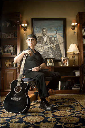 2006: Dion DiMucci in his music room at home in Florida, where a huge portrait he painted of 1930s bluesman Robert Johnson hangs on the wall behind him. 
