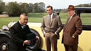 Oddjob, Goldfinger’s man-servant, is about to decapitate a statue with a throw of his steel-brimmed derby.