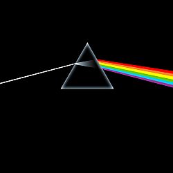 1973: Pink Floyd’s “Dark Side of the Moon” album cover featuring refracting prism. Click for album.