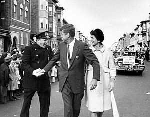 1958: Senator John F. Kennedy & Jackie greeting Boston police officer on Chelsea Street in south Boston.