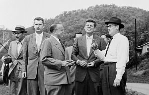 May 1959:  Senator John F. Kennedy being briefed by local officials in West Virginia in early May.