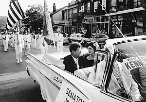 1959: JFK and Jackie in parade during campaign trip to Wheeling, West Virginia.  Photo, Mark Shaw.