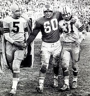 Dec. 26th, 1960: Chuck Bednarik, # 60 walking off the field with Jim Taylor #31 & Paul Hornung #5 of Green Bay Packers after Eagles won NFL Championship game.