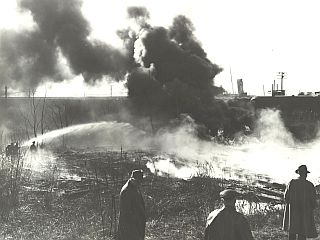 1951: Oil Burning in the Cuyahoga River, located in the downtown Cleveland Flats area.