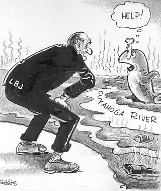 1960s: A Cleveland Press cartoon from Bill Roberts has a distressed fish from the polluted Cuyahoga River seeking help from President Lyndon B. Johnson (LBJ).