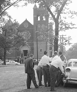 May 21, 1961: A contingent of Federal marshals gather to watch over civil rights activists and Freedom Riders coming to rally at the First Baptist Church in Montgomery. AP photo.